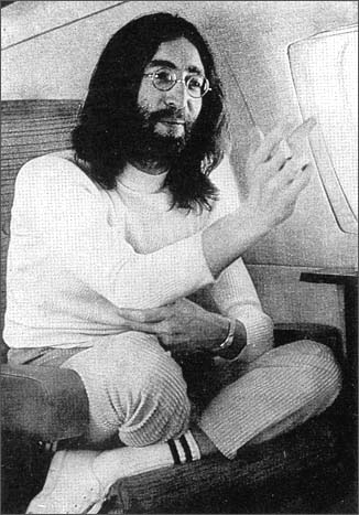 John Lennon on the plane to Gibraltar